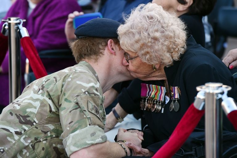 Prince Harry kisses Daphne Dunne