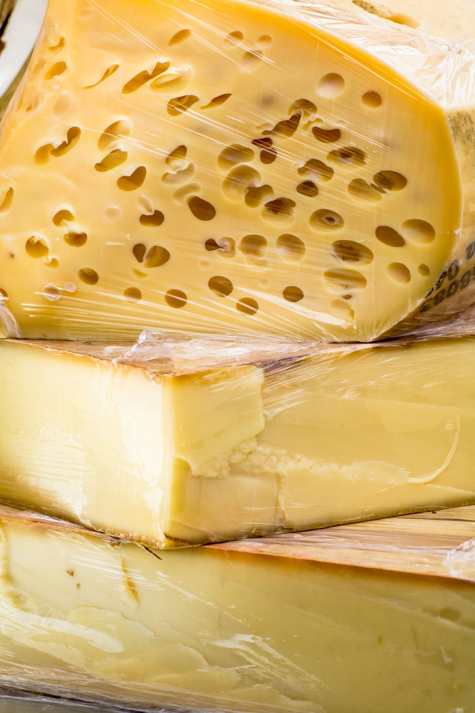 Food, Ingredient, Cheese, Dairy, Cuisine, Parmigiano-reggiano, Processed cheese, Sheep milk cheese, Limburger cheese, Snack, 