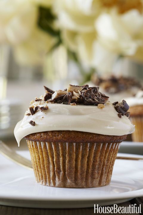 pumpkin cupcake with maple frosting and chocolate on shavings on top