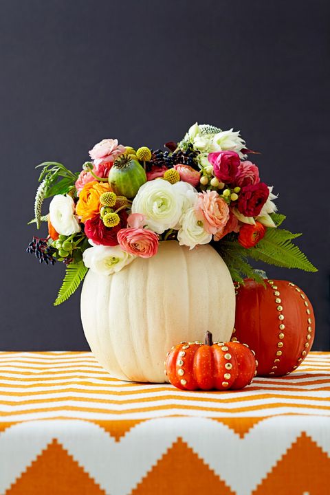 fall flowers in a pumpkin