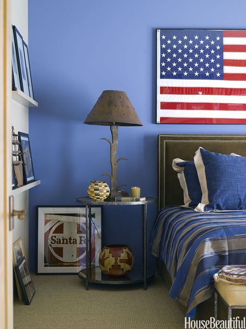 blue bedroom with flag