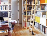 home office with ceiling high shelves
