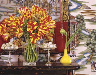 Parrot tulips and a yellow vase on a sideboard; featured in the June 2007 issue.