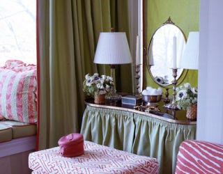 Skirted vanity in a master bedroom.