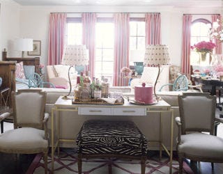 pink living room with zebra stripe chair