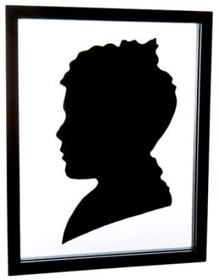 a black and white silhouette of a boy