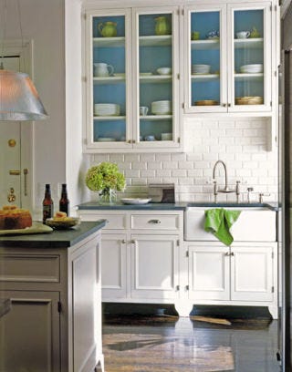 white kitchen with glass cabinets