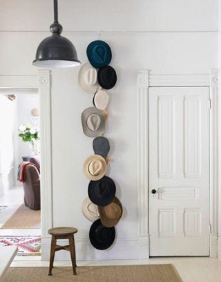 hats hanging on the wall