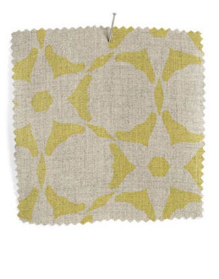 beige and yellow printed fabric