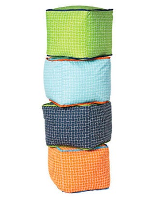four stacked green, aqua, navy and orange beanbag chairs