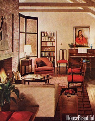 long living room with furniture and fireplace