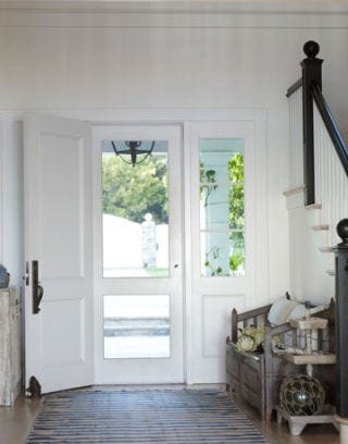 screen door in white painted entryway