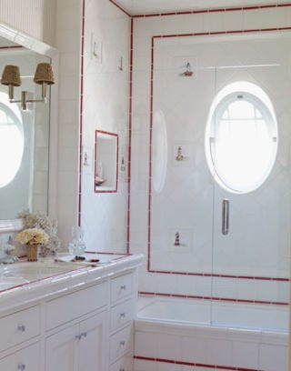 white bathroom with red line tile outlines