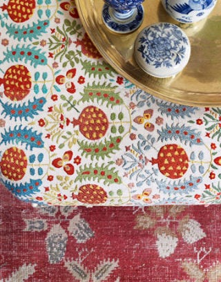 suzani fabric on ottoman