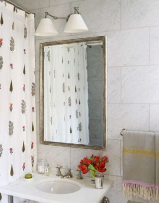 white bathroom with marble tile