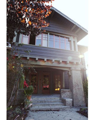 front of a caftman style hosue