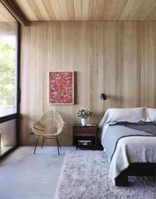 modern bedroom in wood and windows