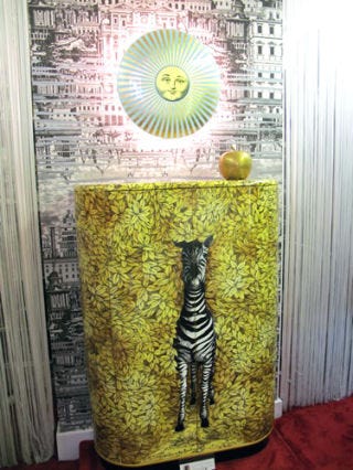 Yellow, Organism, Zebra, Art, Terrestrial animal, Visual arts, Sculpture, Tail, Creative arts, Felidae, 