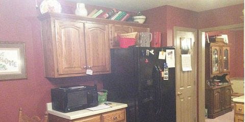 BEFORE & AFTER: Black Countertops And White Paint Work Wonders