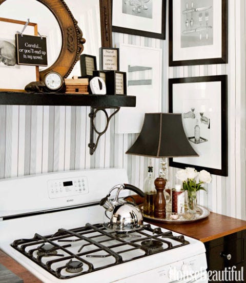 photo frames above stove