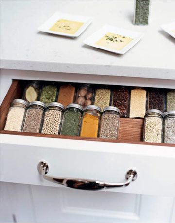 a spice drawer filled with spices