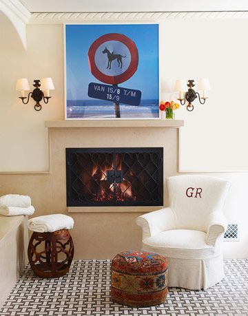 bathroom with fireplace and chair