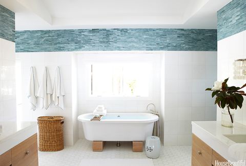 blue and white bathroom with bamboo cabinets