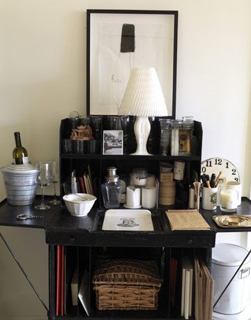 brown desk with photos