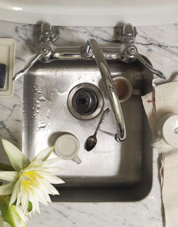 stainless sink with marble countertop