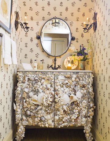 shell covered vanity in powder room