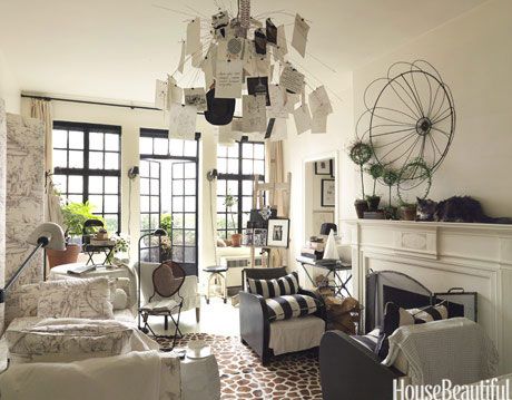 a room with a bulletin board chandelier.