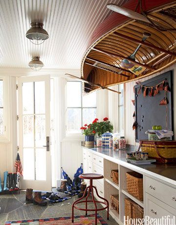 canoe on the ceiling of a mudroom