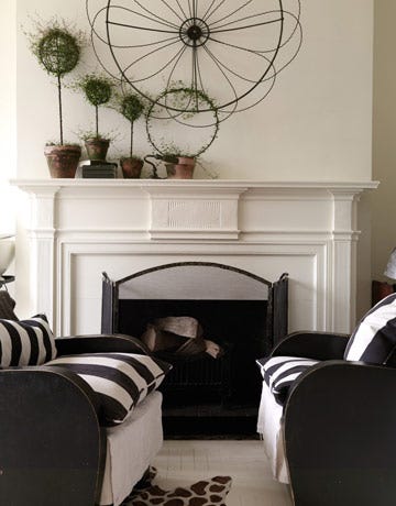 Studio Apartment Decorating Ideas How To Decorate A Striped Sofas By A Fireplace Thomas Loof Small Scale Club Chairs