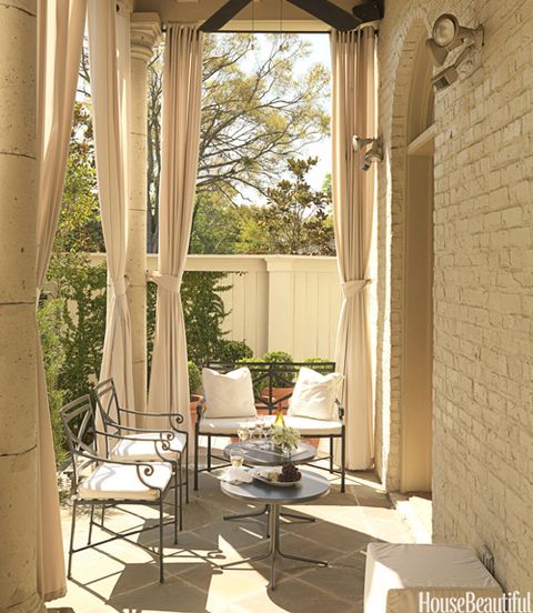outdoor porch with curtains