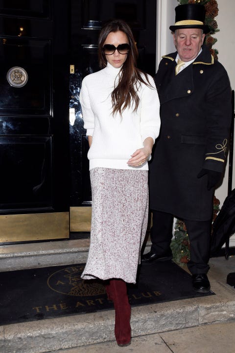 hbz-skirts-boots-01 LONDON, UNITED KINGDOM - DECEMBER 12: Victoria Beckham seen leaving The Arts Club, Dover Street on December 12, 2014 in London, England. Photo by Neil Mockford/Alex Huckle/GC Images)