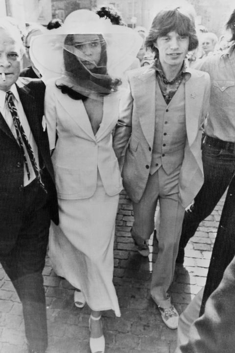 13th May 1971, British rock singer Mick Jagger and his new wife Bianca Jagger outside St Tropez Town Hall on their wedding day. (Photo by Express/Getty Images)