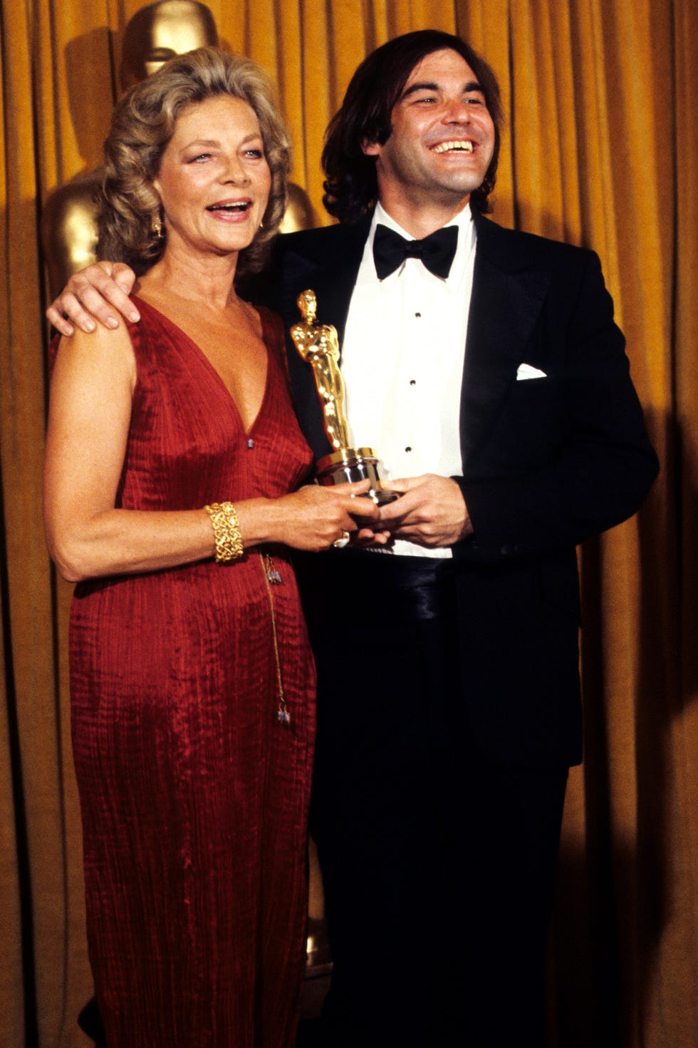 <p>Vintage isn't just for kids as evidenced by Lauren Bacall in this iconic dress at the Oscars.</p>