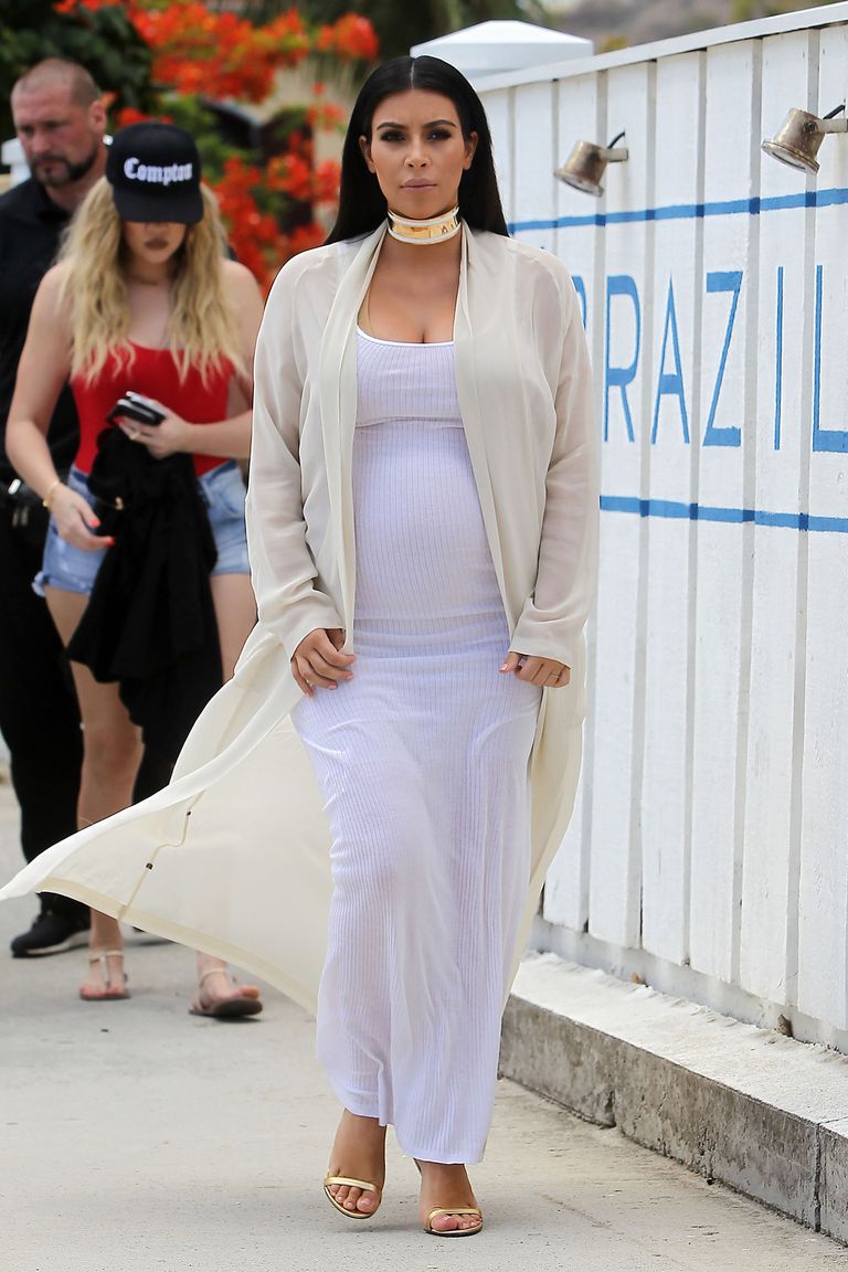 Kim Kardashian Shows Off Baby Bump in Sheer Dress at Givenchy Spring ...