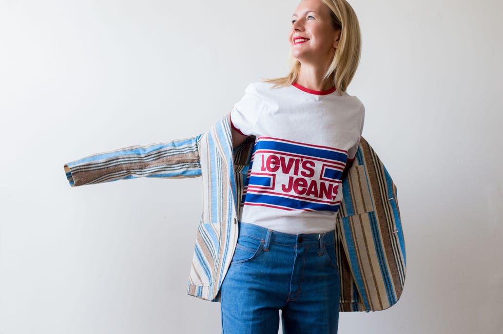 <p class="MsoNormal" style="margin-bottom:10.0pt"><strong>HB: What's your trick to wearing those fun, standout vintage pieces in real life?<o:p></o:p></strong></p><p class="MsoNormal" style="margin-bottom:10.0pt"><strong>NJ: </strong>You have to be audacious. And there's phases and moments when I don't wear vintage. Now I'm like, totally into a vintage craze. I'm wearing my Saint Laurent platforms, the green ones, and then like tiny little '60s dresses. I keep buying them, I'm like a little obsessed. But it's the thing right now any way.</p><p><em><a href="http://shop.talesofendearment.com/collections/frontpage/products/levis-t-shirt" target="_blank">Levi's</a> shirt; <a href="http://shop.talesofendearment.com/collections/frontpage/products/striped-70s-blazer" target="_blank">Granee</a> blazer, $195; <a href="http://shop.talesofendearment.com/collections/frontpage/products/70s-jeans" target="_blank">'70s Jeans</a>, $179.</em></p>