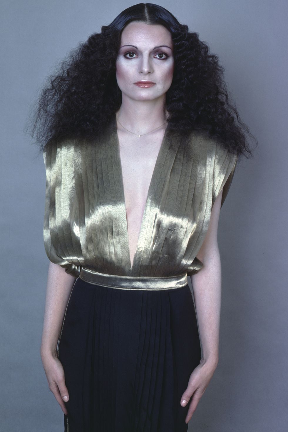 <p>The Lebanese-Basque designer made her passion for structure, including her bulky 1980s shoulder pads, a mainstream trend for all womenswear. Kamali was all about creating new shapes, from her infamous "sleeping bag coat" to her streamlined one-piece swimsuits, made famous by Farrah Fawcett in <i>Charlie's Angels</i>.<strong></strong></p>