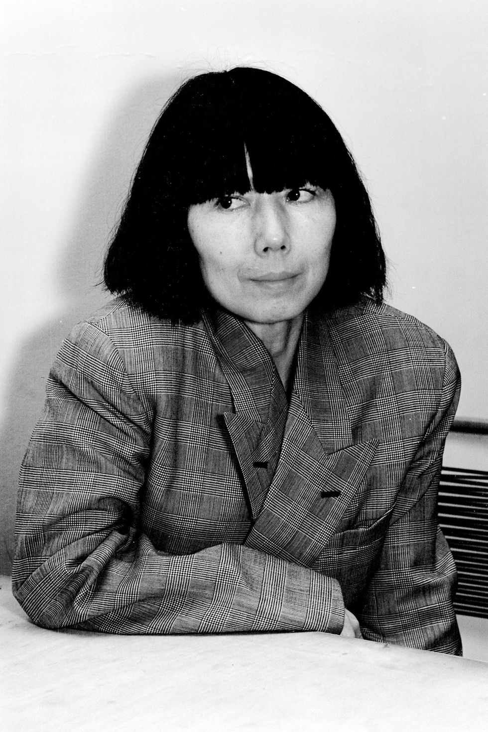 As a woman designing for other women,  Rei Kawakubo has always challenged the traditional social constructs of fashion, never compromising on art over wearability. With a background in fine arts, she launched Comme des Garçons in 1973 and showed her first collection in Paris in 1981. Her large, geometric frames and deconstructed, ripped and torn dresses in neutral color palettes have established her fiercely modern style. 