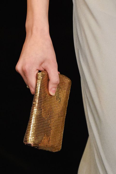 <p>High fashion is embracing tech—your post-modern clutches are now equipped for your iPhone 6. </p><p><em>Pictured: Saint Laurent</em> </p>