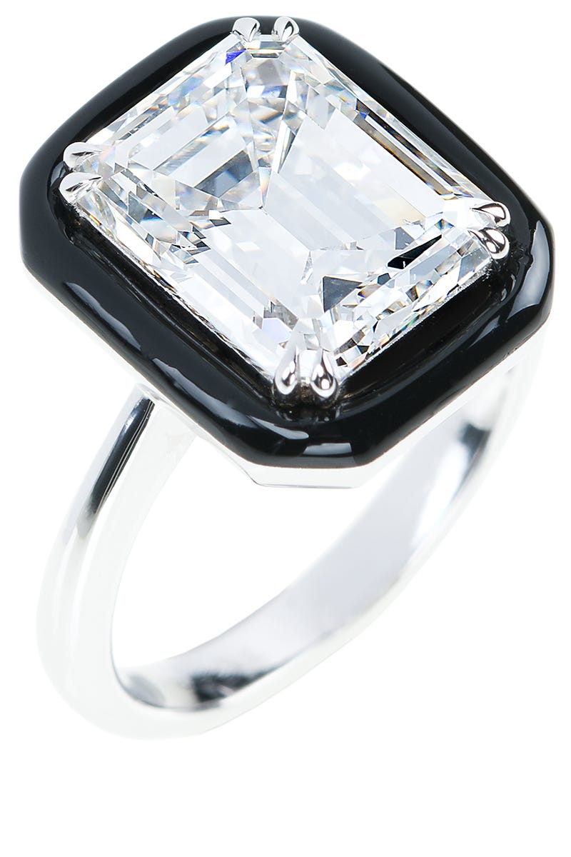 <p>A Greek designer who learned the tricks of the trade studying Gemology and through his family's generations-old business in the industry, Koulis translates all inspiration through a contemporary lens, revisiting stark shapes, bold color and his signature craftsmanship for his bridal collection, named <i>Oui.</i> </p><p>          <em><a href="http://nikoskoulis.gr/">Nikos Koulis</a> white emerald-cut diamond with black enamel frame. Price Upon Request, Bergdorf Goodman, <a href="file://localhost/javascript/void(0)" title="Call via Hangouts">(888) 774-2424</a>.  </em><em></em></p>