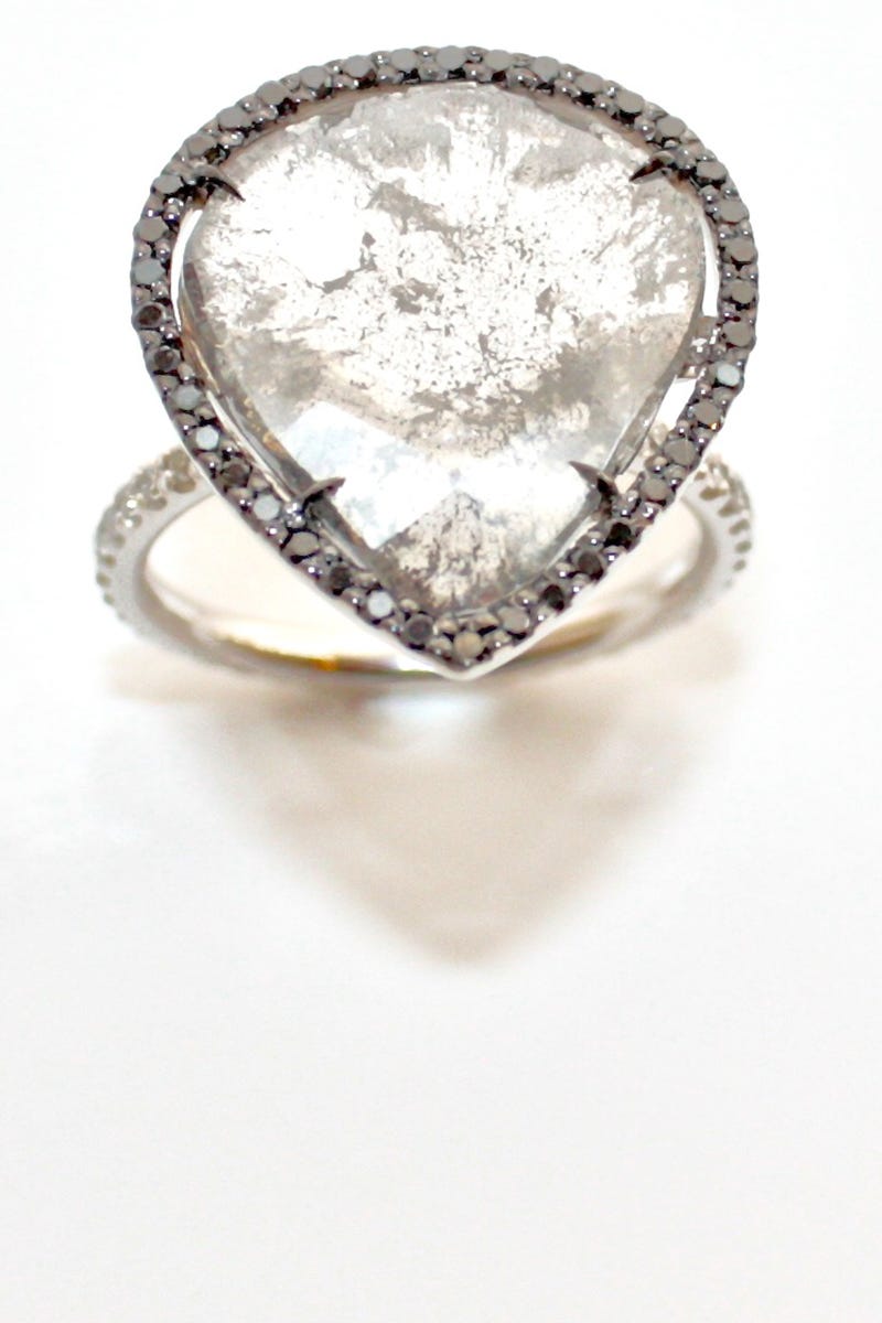 <p>An alum of famed jewelry house, Asprey, Sharon Khazzam's unique aesthetic, which combines her thorough understanding of workmanship with an artistic edge, makes each engagement ring she designs for her clientele one that stands out from the rest.</p><p>
<em>Sharon Khazzam "Chornio" floating pear-shaped diamond slice </em><em>ring with fine, pave black diamond halo. Price Upon Request, <a href="http://sharonkhazzam.com/">sharonkhazzam.com </a></em><em><a href="http://sharonkhazzam.com/"></a></em></p>