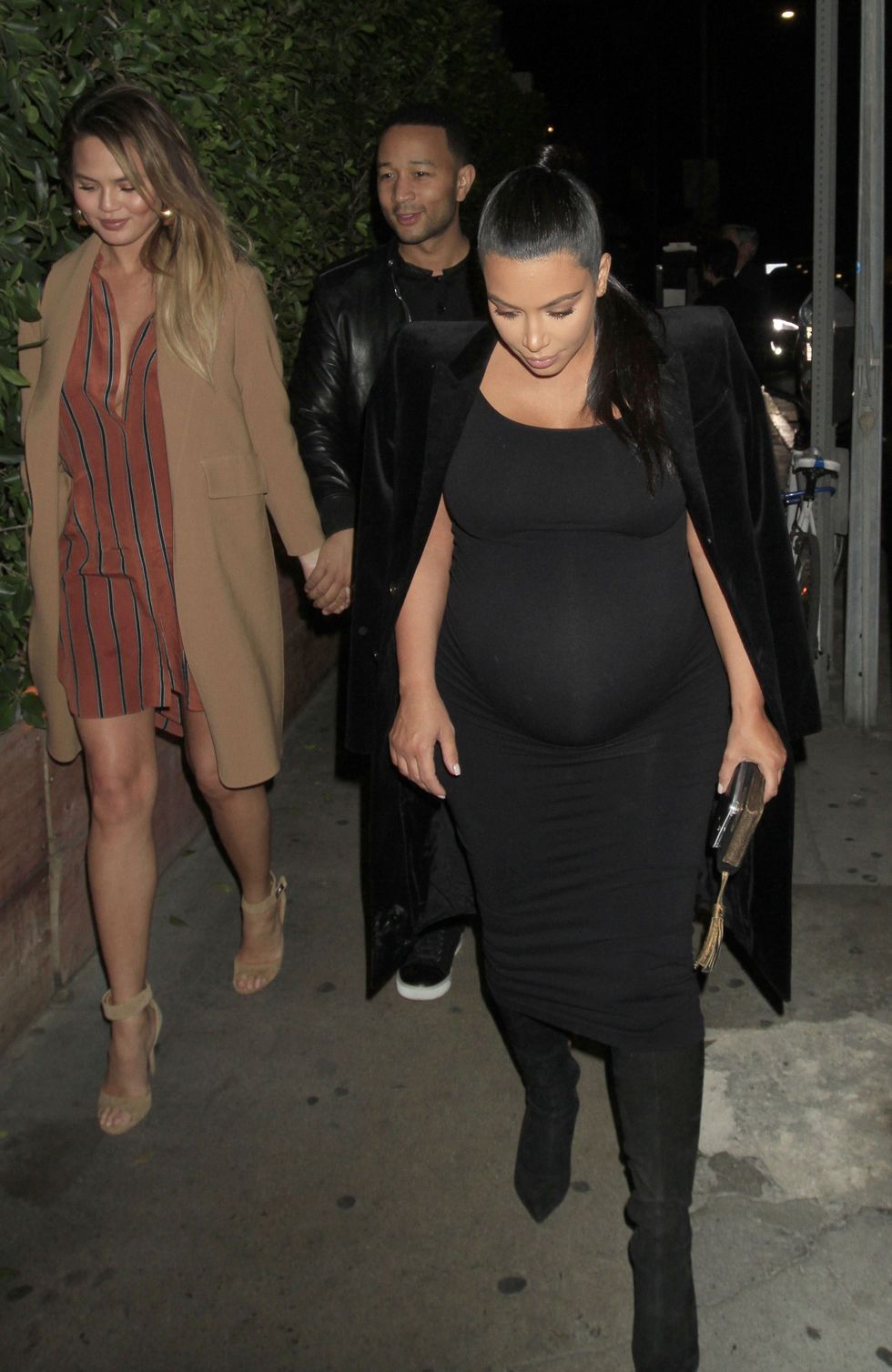 Chrissy Teigen Models & Supports Kim Kardashian's Maternity Skims  Collection, Chrissy Teigen, Kim Kardashian