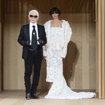 Clothing, People, Dress, Coat, Trousers, Photograph, Standing, Suit, Outerwear, Bridal clothing, 