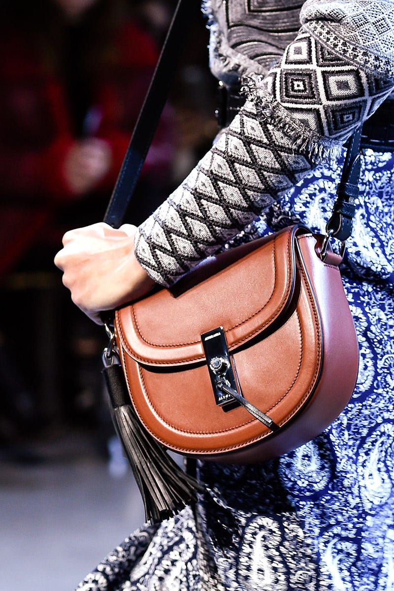Bag, Leather, Street fashion, Tan, Strap, Musical instrument accessory, Pet supply, Horse tack, Shoulder bag, Belt, 
