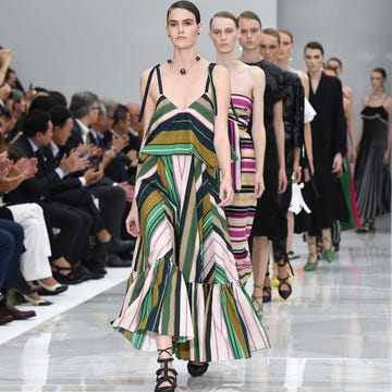 Footwear, Camera, Fashion show, Event, Runway, Outerwear, Dress, Fashion model, Style, Video camera, 