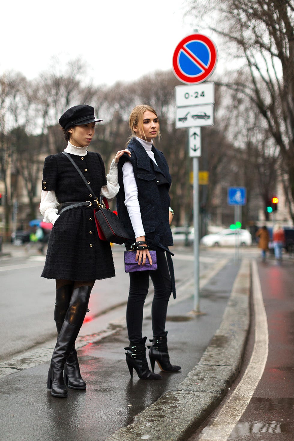 Clothing, Trousers, Road, Street, Road surface, Outerwear, Winter, Coat, Traffic sign, Boot, 