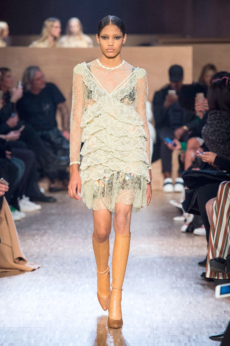 Footwear, Leg, Fashion show, Human body, Shoulder, Joint, Runway, Outerwear, Style, Fashion model, 